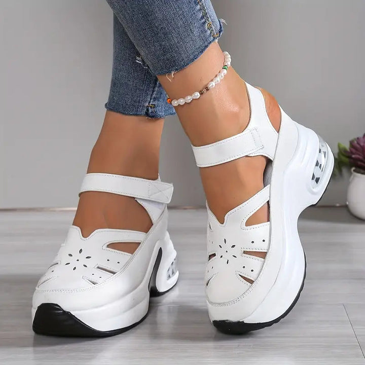 Women's adjustable orthopedic wedge sandals, providing comfortable arch support for all-day summer wear.