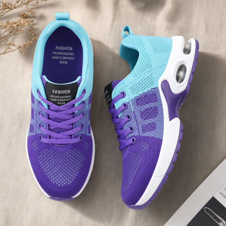 Close-up of advanced sole on women's orthopedic running shoes, designed for shock absorption & foot support.