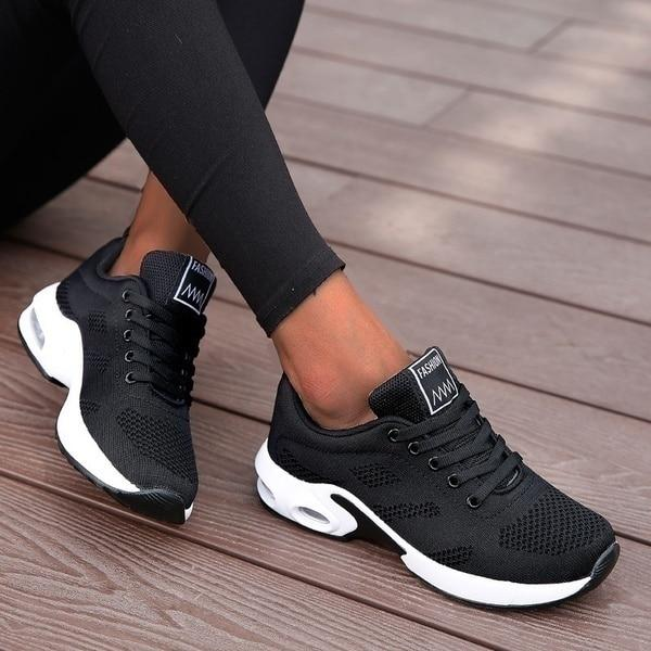 Woman running in orthopedic running shoes, experiencing pain relief and superior foot support for her workout.