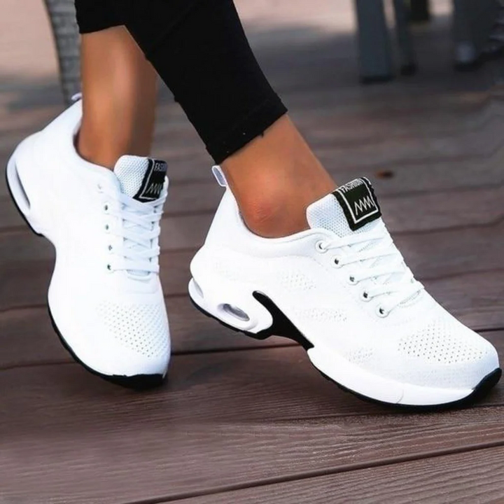 Pair of women's orthopedic running shoes, ideal comfort shoes for wide & narrow feet, providing excellent support.