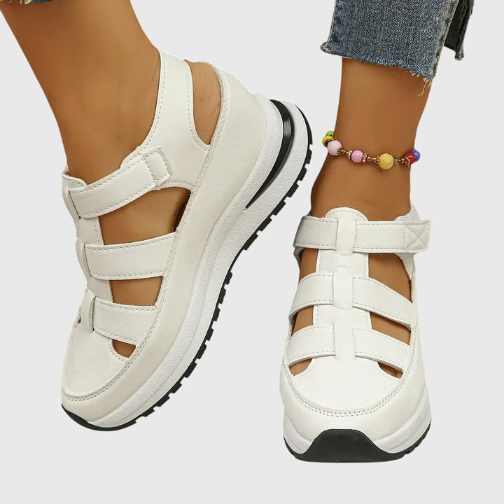 Stylish women's summer sandals featuring adjustable straps, arch support, and non-slip grip.