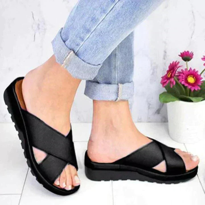 Adjustable women's orthopedic sandals providing a secure fit and superior arch support for summer walking.