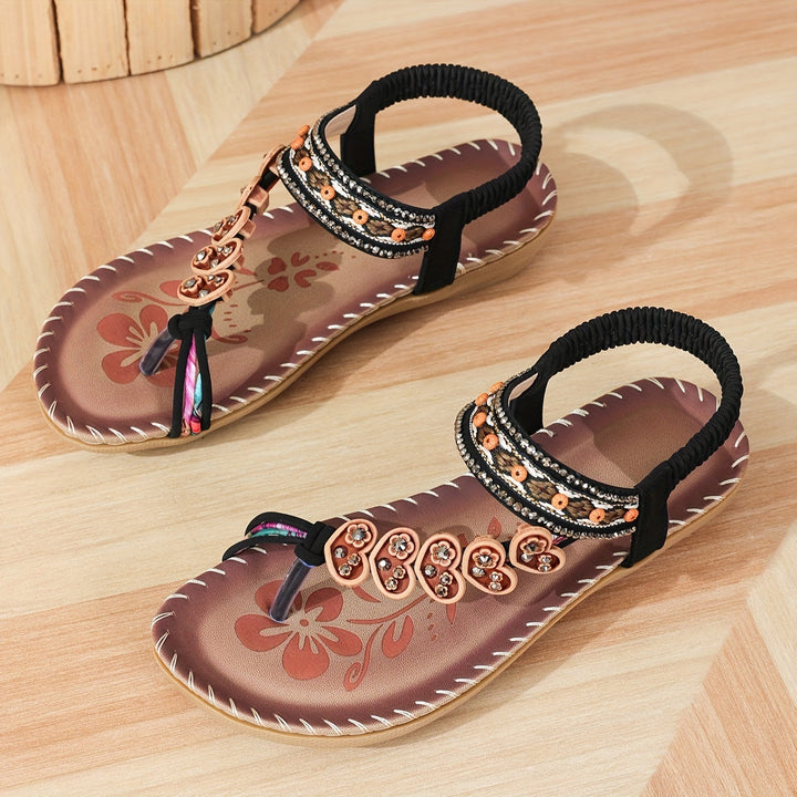Top view of women's comfort sandals with open-toe design, adjustable straps, and ergonomic arch support.