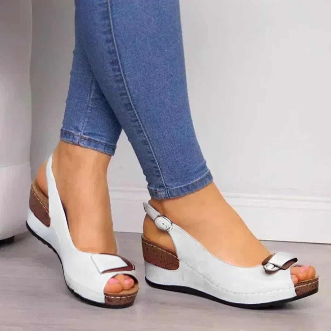 Stylish women's orthopedic sandals, designed with cushioned footbed and arch support for ultimate comfort.