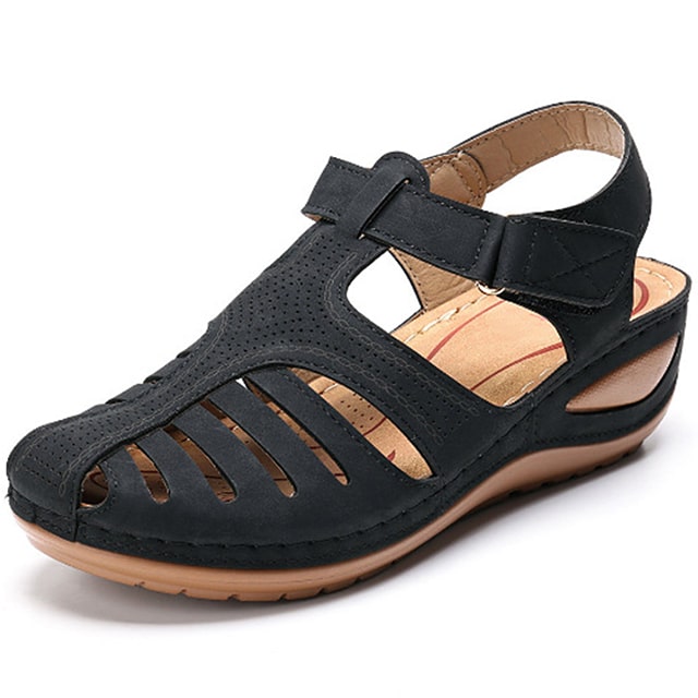 Women's orthopedic sandals with ergonomic arch support for foot pain relief.