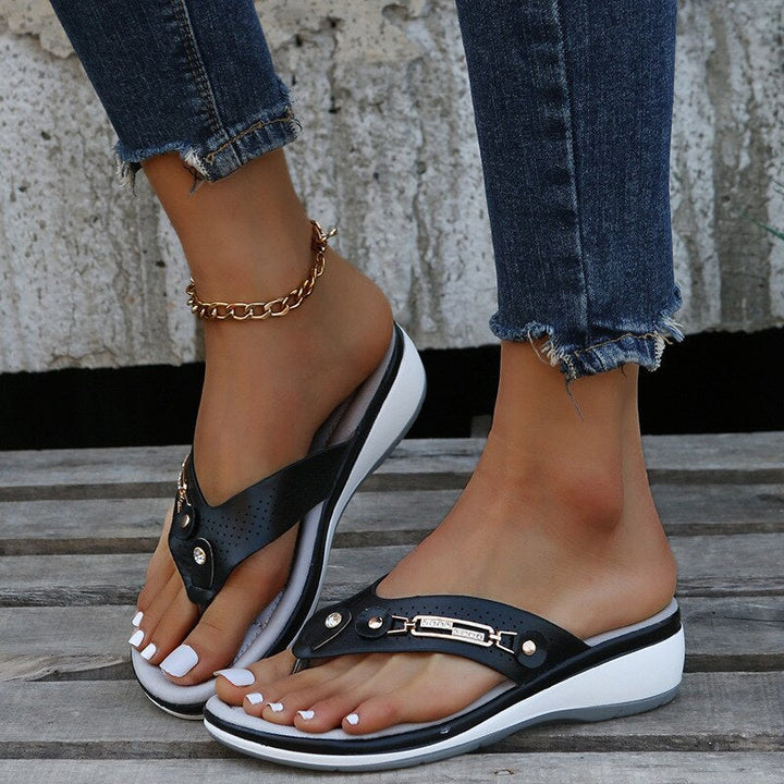 Comfortable women's orthopedic sandals, featuring arch support & a soft, padded footbed for daily wear.