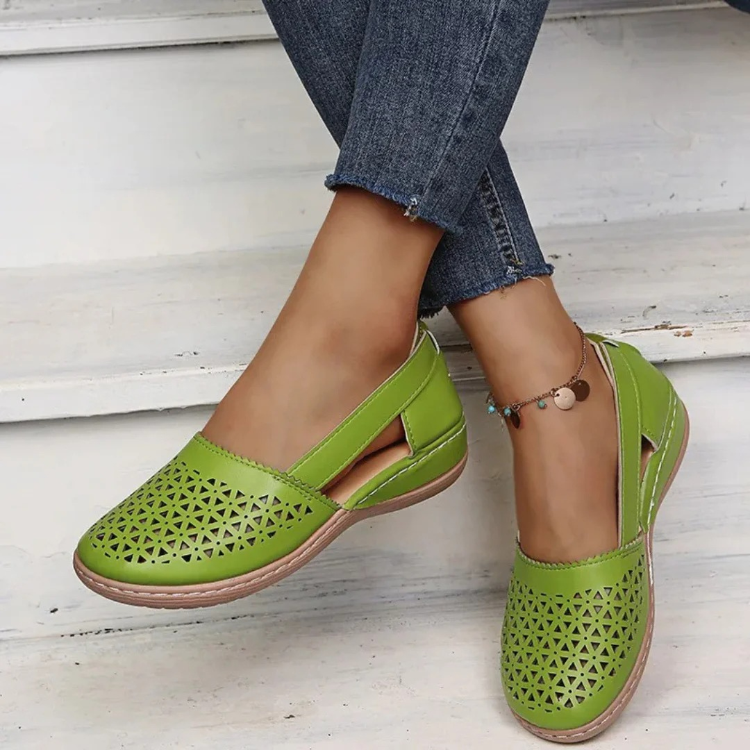 Women's orthopedic slip-on wedge flats, providing superior arch support & all-day comfort.