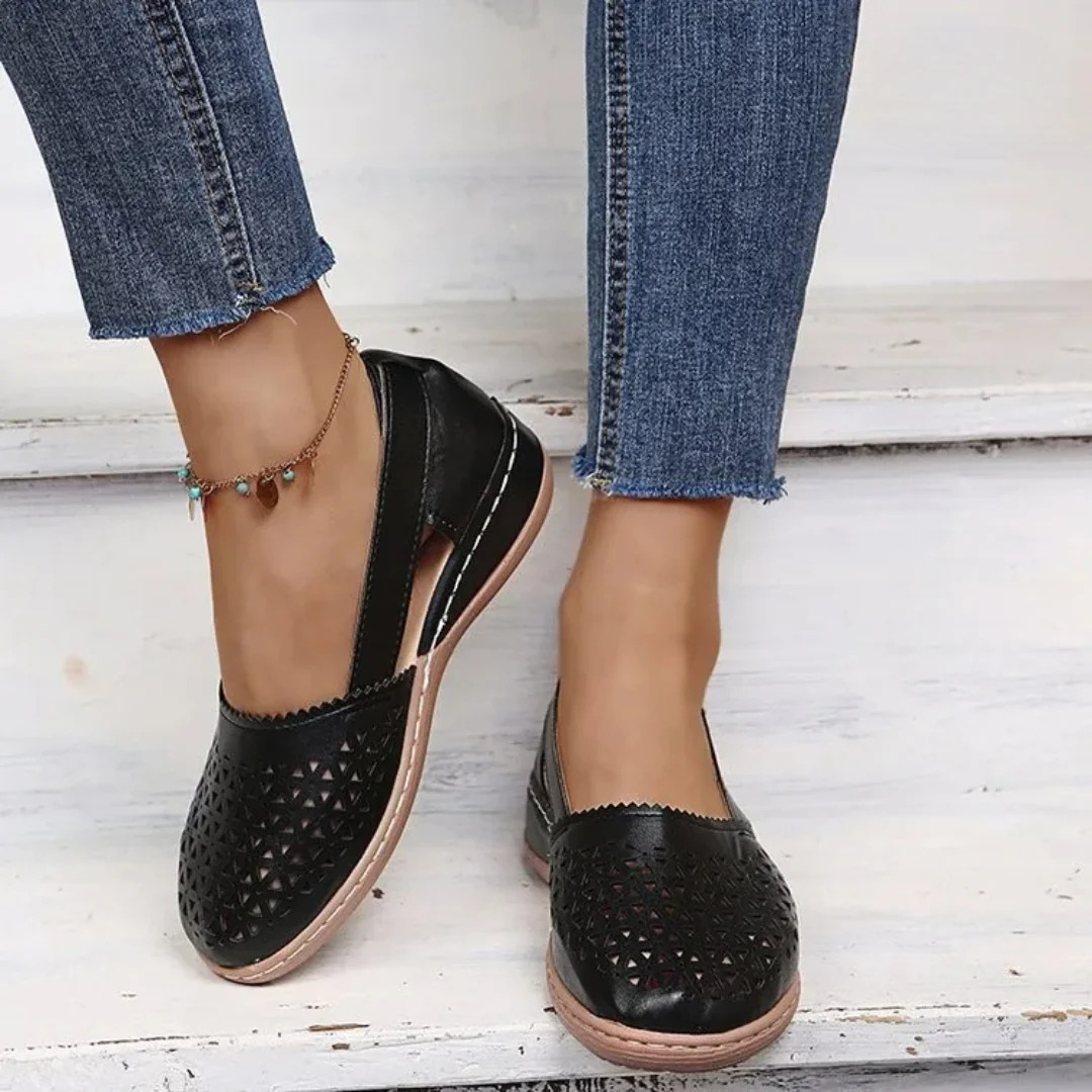 Comfortable women's slip-on flats, orthopedic design with arch support for extended wear.
