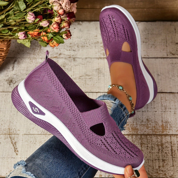 Breathable perforated women's slip-on sneakers, orthopedic design for all-day casual comfort.