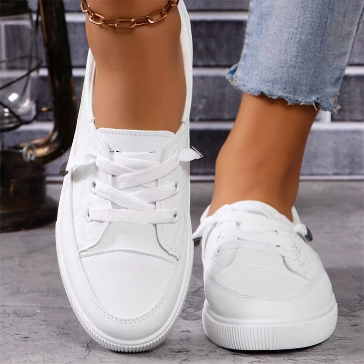 Comfortable women's orthopedic walking shoes, arch support design in a stylish sneaker.