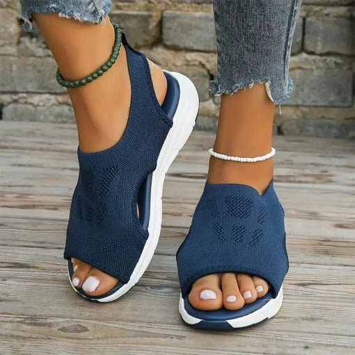 Stylish slip-on women's sport sandals with cushioned arch support, ideal for summer & casual wear.