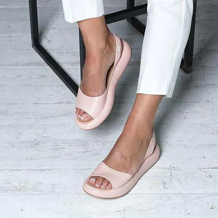 Women's orthopedic summer sandals with slingback strap, offering arch support for comfortable everyday wear.