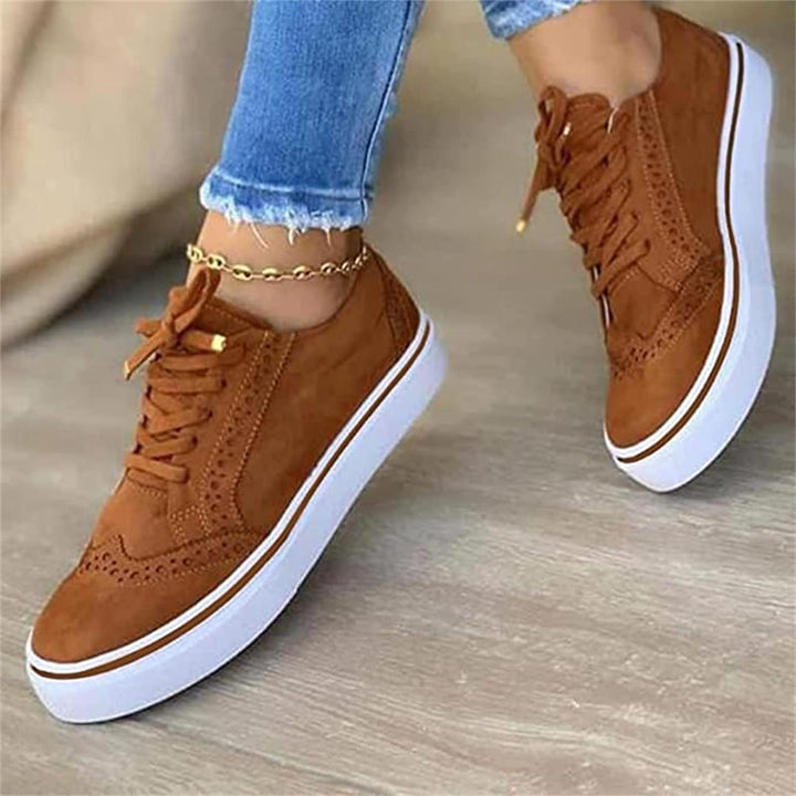 Stylish women's breathable lace-up sneakers, offering orthopedic comfort and foot support for walking.