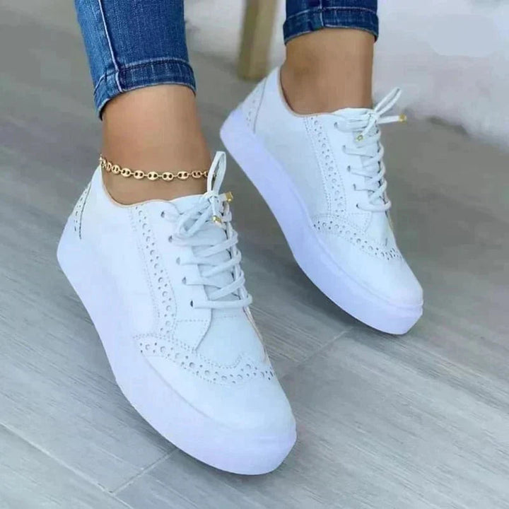 Everyday women's comfort walking shoes, featuring orthopedic support, breathable fabric, and secure lace-up fit.