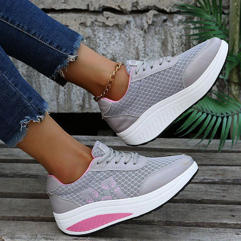 Women's supportive orthopedic sneakers, designed for long walks & foot health.