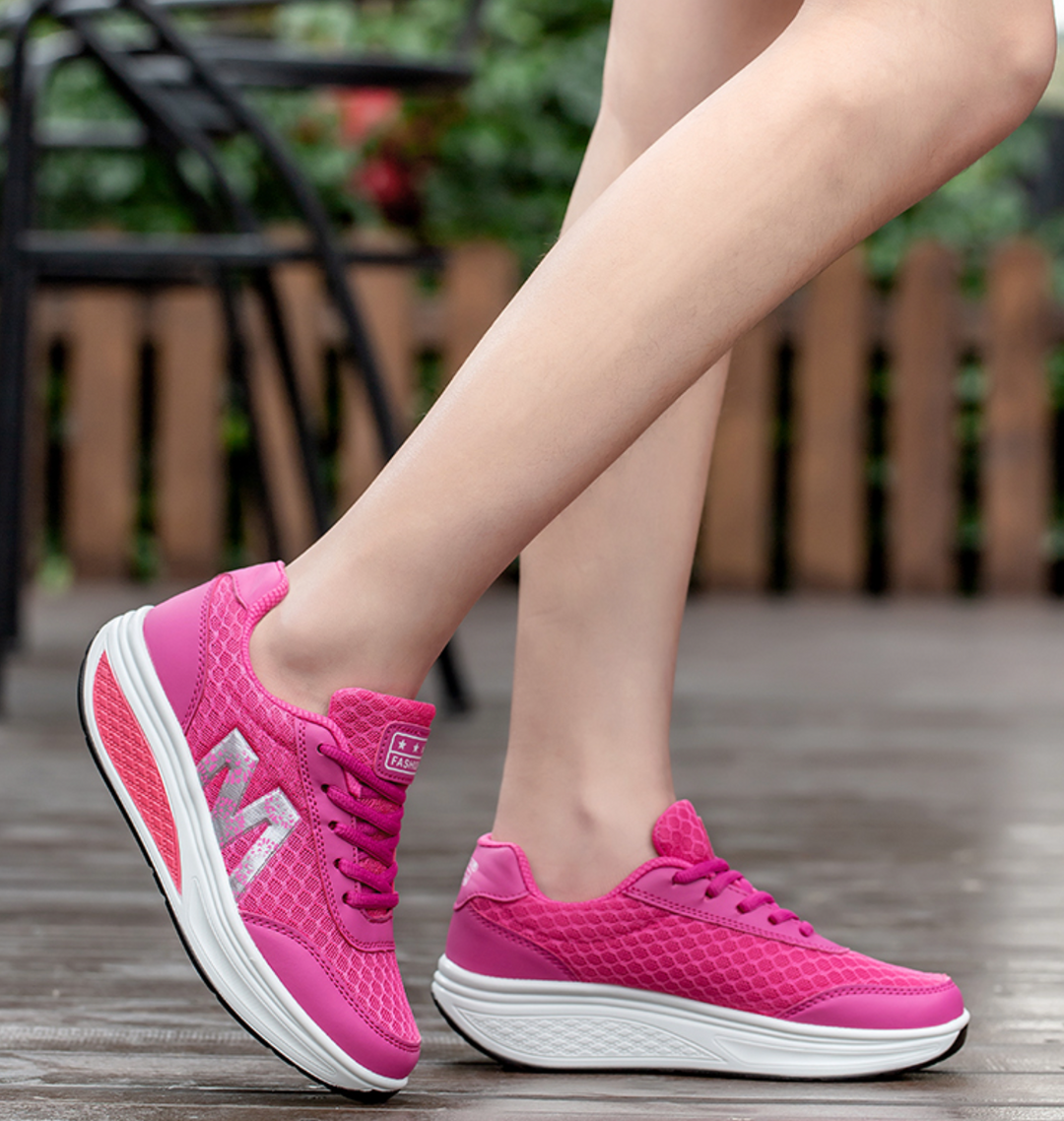 Durable orthopedic walking sneakers for women, ensuring posture support & comfort.