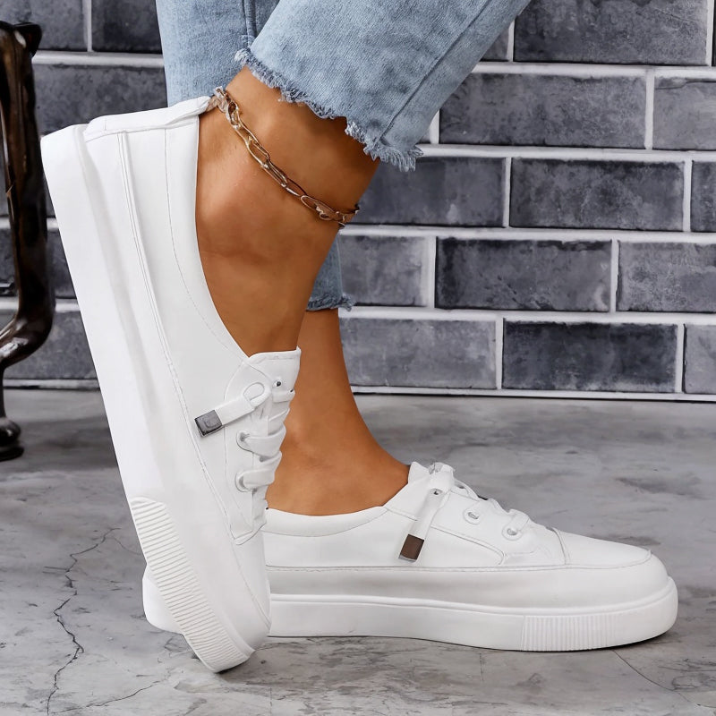 Athletic women's sneakers with advanced arch support. Comfortable & stylish for casual or active wear.