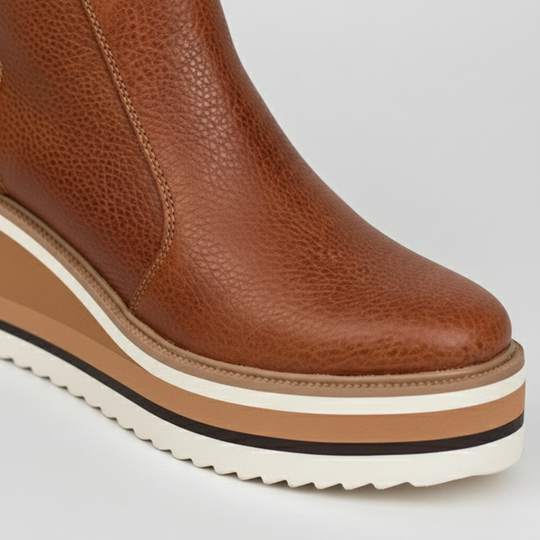 Comfortable women's ankle boots with orthopedic wedge heel. Perfect fall & winter fashion boots with support.