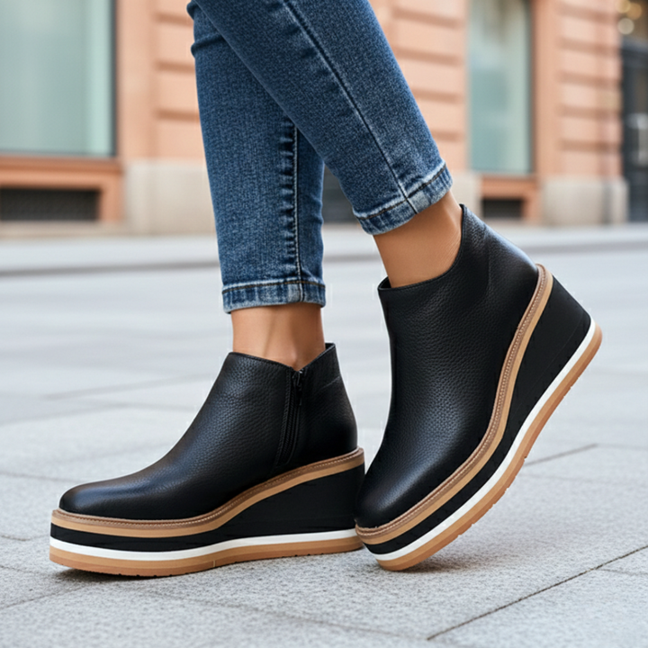 Women's fashion boots: wedge heel ankle design for comfort & style. Platform boots with orthopedic support.