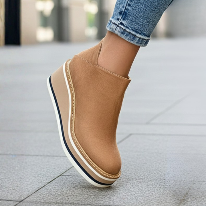 Everyday wear women's ankle boots. Orthopedic wedge heel provides comfort & stability. Stylish fall footwear.
