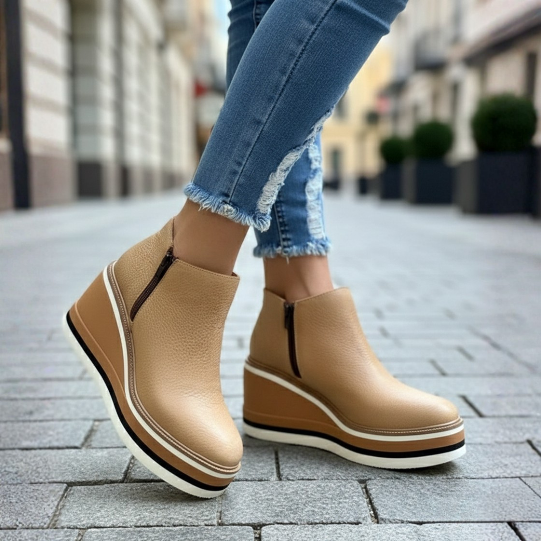 Zip-up women's wedge ankle boots, ideal for winter. Comfortable orthopedic platform boots for all-day wear.