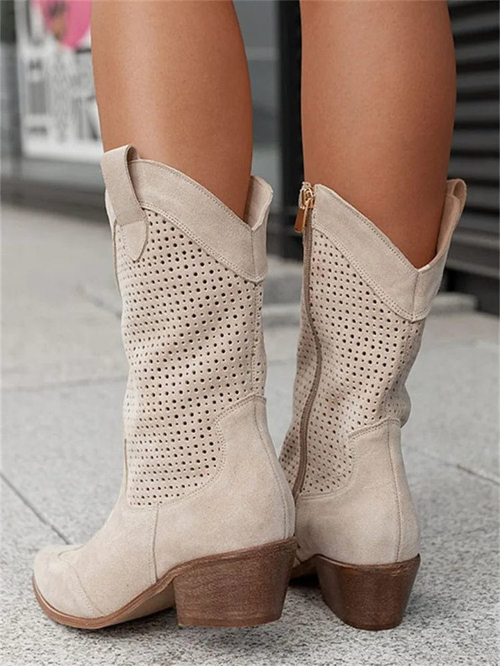 Perforated western ankle boots for women, orthopedic comfort, side zipper & stable block heel.