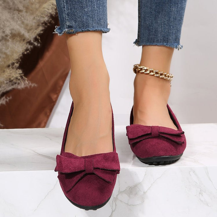 Wide fit orthopedic ballet flats for women, ensuring comfortable all-day wear & foot relief.