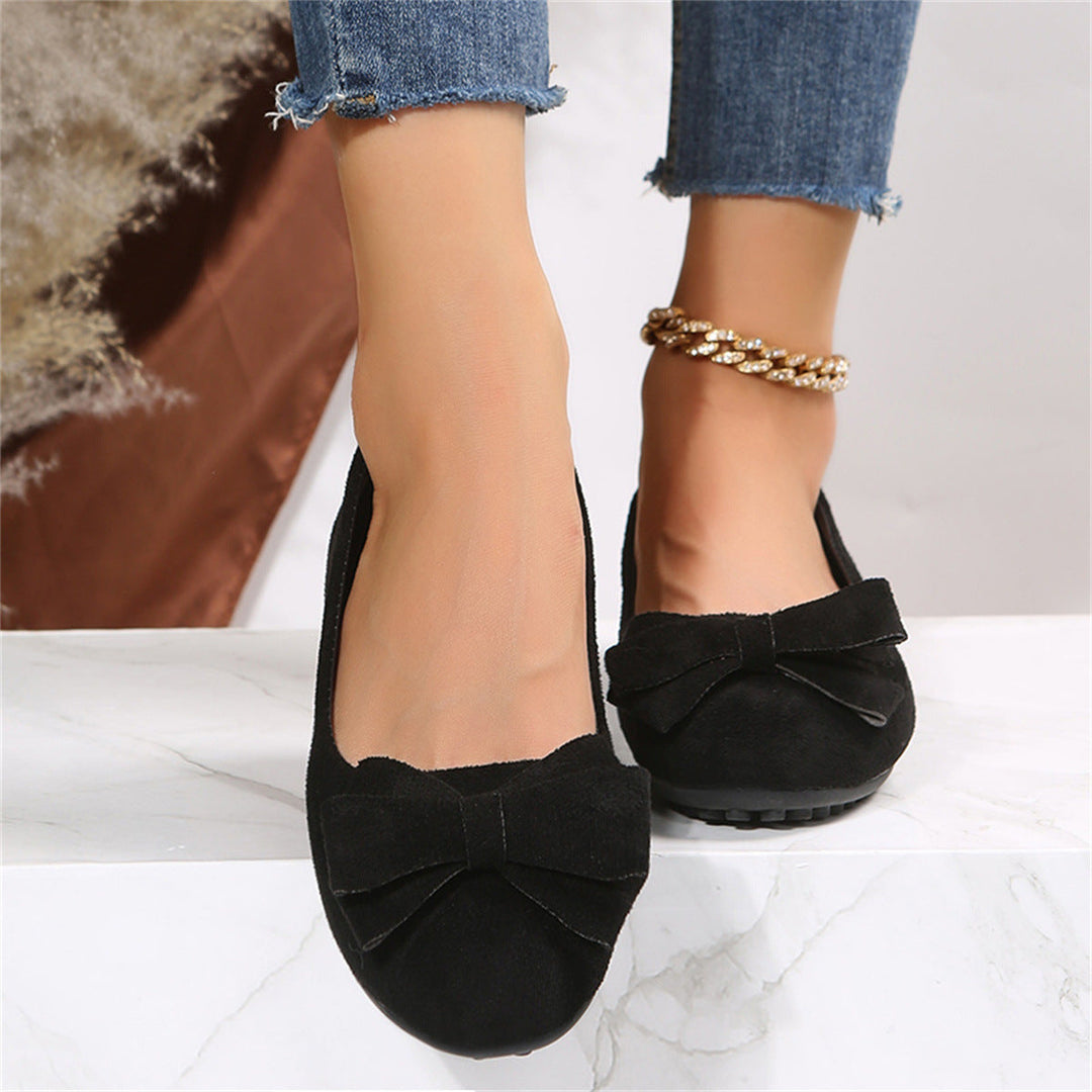 Comfort-first women's wide fit ballet flats with orthopedic features for all-day support.
