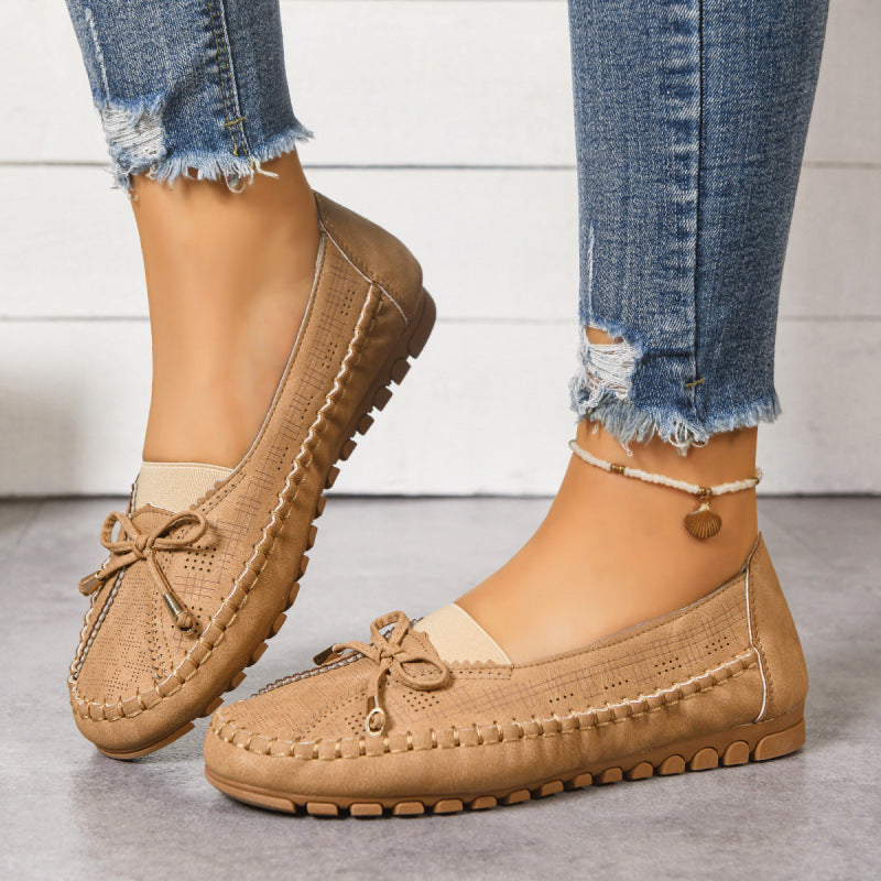 Women's orthopedic wide fit slip-on loafers with cushioned comfort for everyday support.
