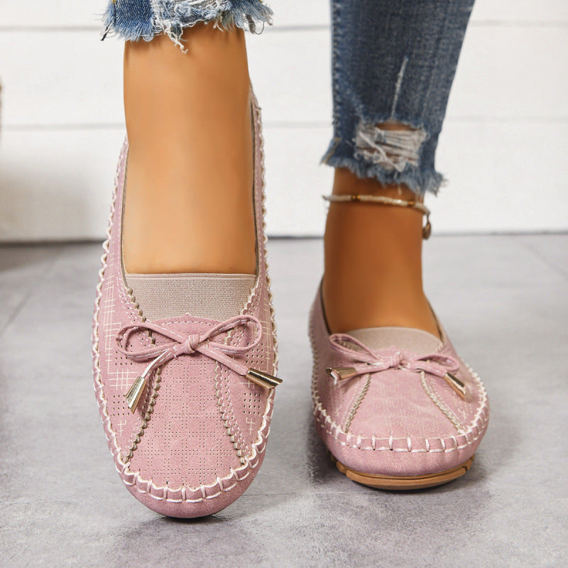 Pink wide fit slip-on orthopedic loafers for women, providing all-day cushioned comfort.