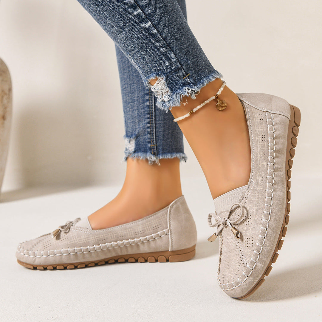 Grey women's wide fit orthopedic loafers, designed for cushioned comfort & foot support.