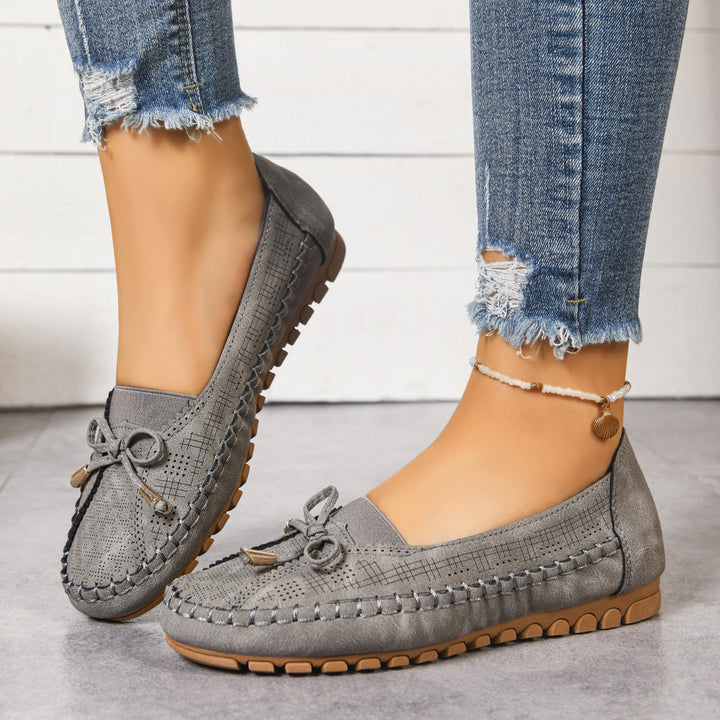 Orthopedic women's slip-on loafers in a wide fit, with cushioned insoles for ultimate comfort.