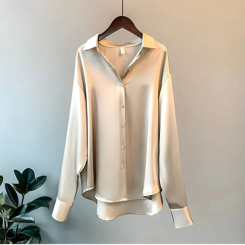 Women's oversized button down blouse. Relaxed fit, long sleeve for versatile elegant style & comfort.