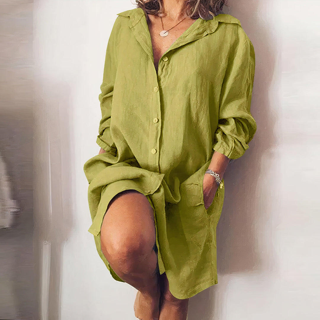 Oversized, relaxed fit women's button down midi shirt dress, versatile for various occasions.