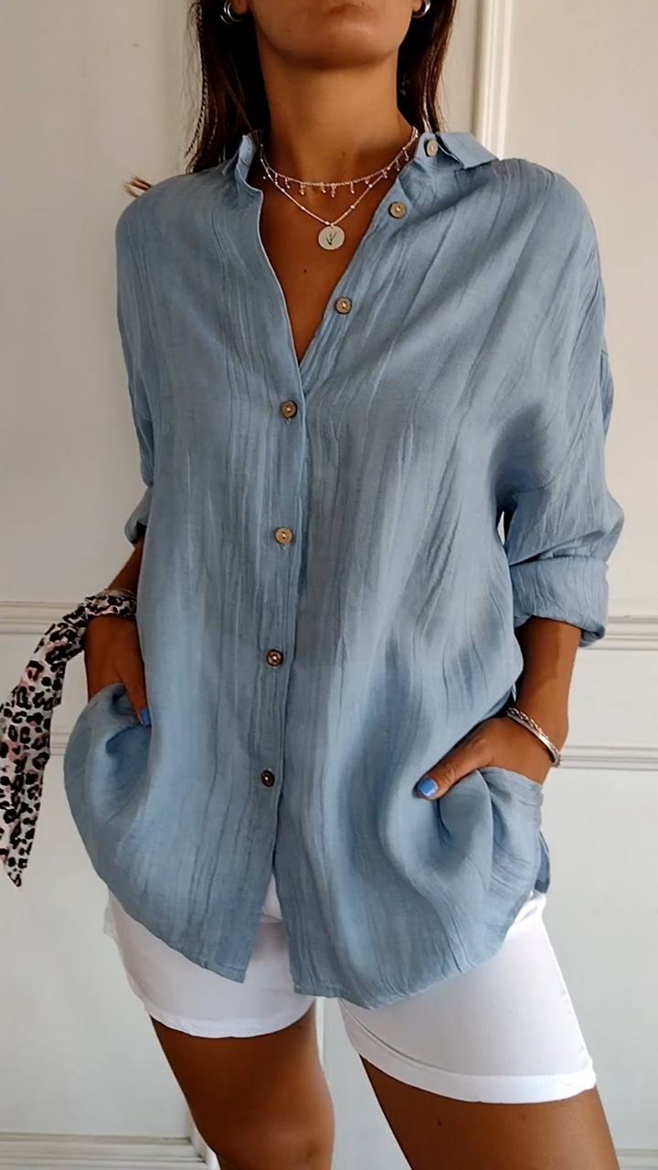 Women's oversized button-down shirt, long sleeve & relaxed fit, perfect for casual spring fashion.