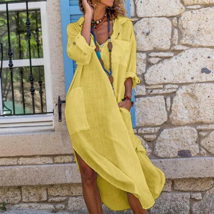 Chic women's oversized button-front shirt dress, offering versatile style for everyday casual or summer fashion.