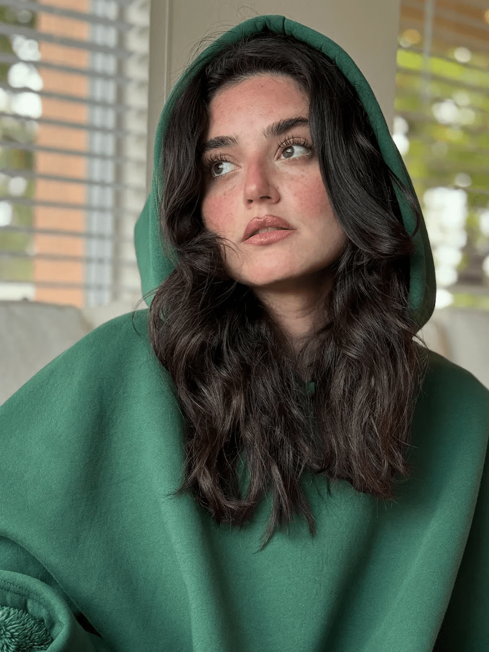 Deep pocket women's oversized hoodie, offering ultimate calming comfort & practicality.