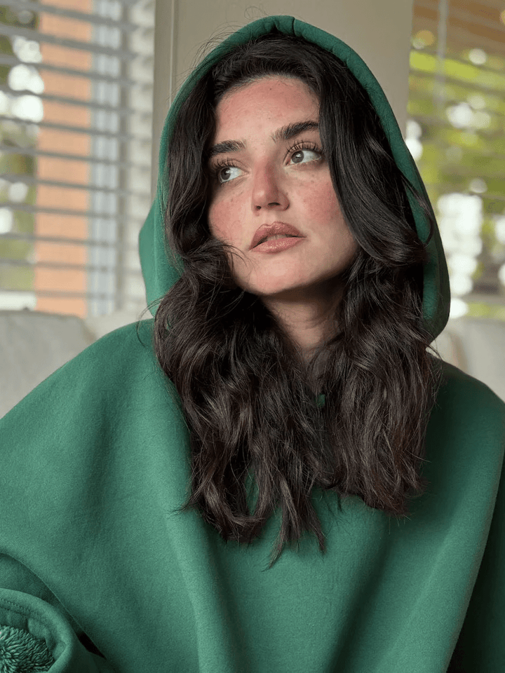 Deep pocket women's oversized hoodie, offering ultimate calming comfort & practicality.