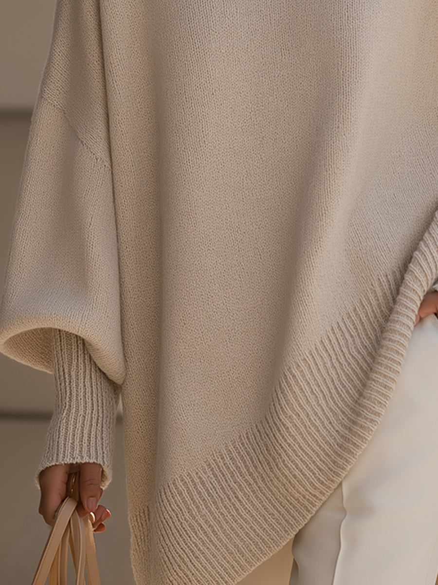 Stylish women's batwing sleeve sweater, an elegant oversized cape poncho, comfortable for autumn fashion.