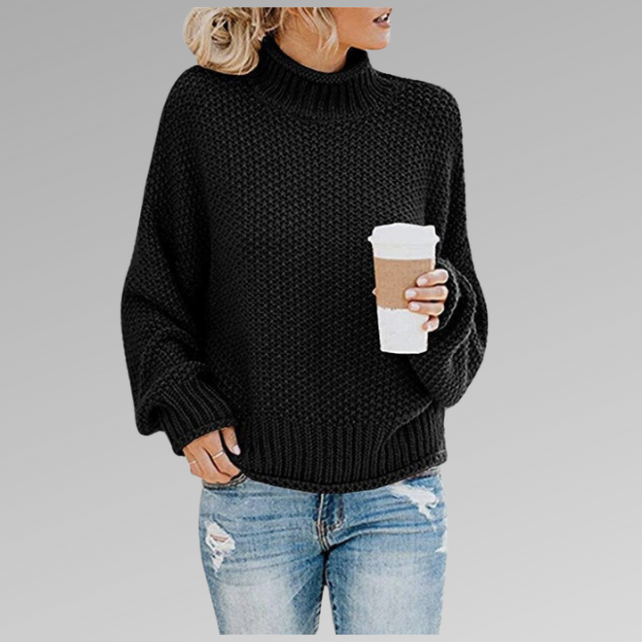 Stylish women's oversized turtleneck pullover sweater with a relaxed chunky knit for fall and winter.