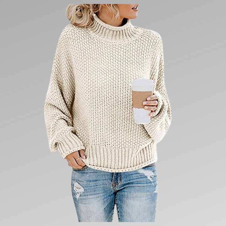 Elegant women's oversized turtleneck pullover, chunky knit for a warm, comfortable and stylish winter look.