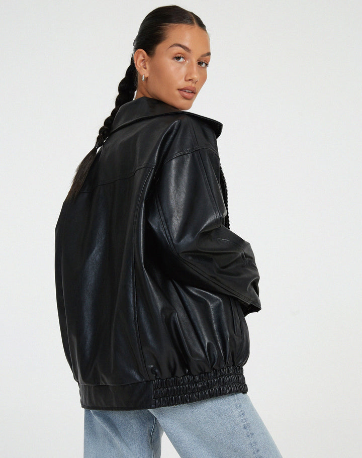 Women's oversized faux leather bomber jacket with a front zipper closure, practical for fall weather.