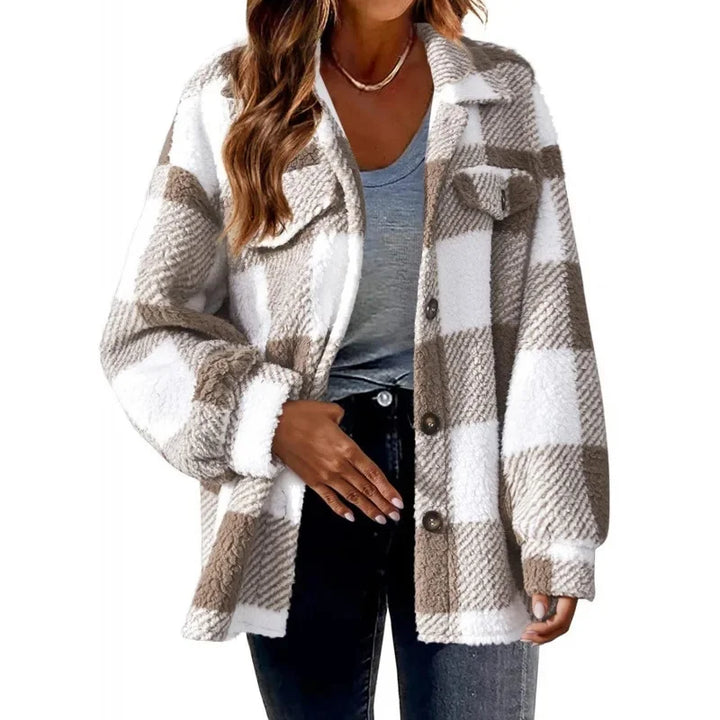 Soft fleece women's oversized plaid shacket, button-front jacket for casual layering.