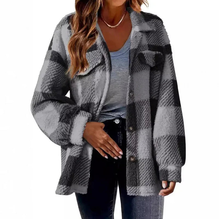Women's oversized fleece plaid shacket, button-up, offering warmth and casual elegance.