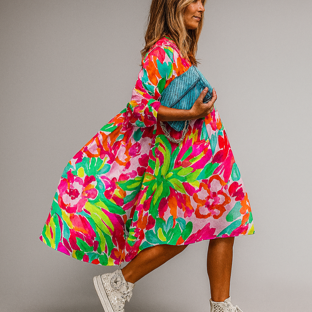 Women's oversized floral print midi dress with puff sleeves, perfect for summer casual or brunch.