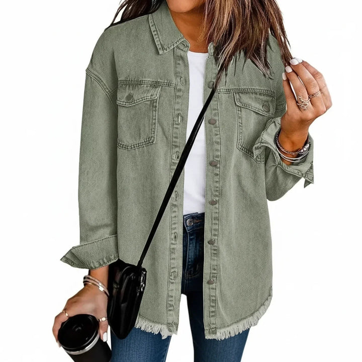 Chic women's oversized jacket, a versatile layering piece with a distinctive fringe hem.