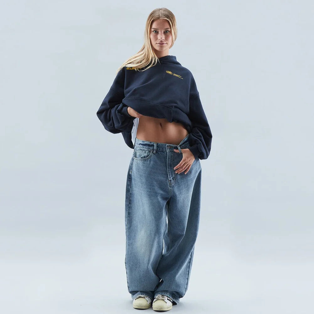 Stylish women's oversized graphic cropped hoodie with drop shoulder, ideal for modern streetwear looks.