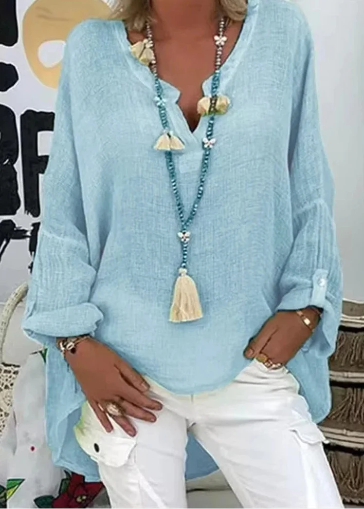Comfortable long sleeve button-up blouse, versatile for casual wear & office fashion.