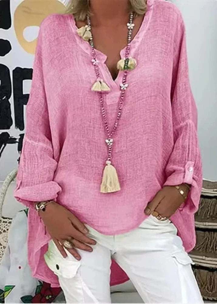 Modern oversized blouse, soft fabric, perfect for a relaxed yet chic look.