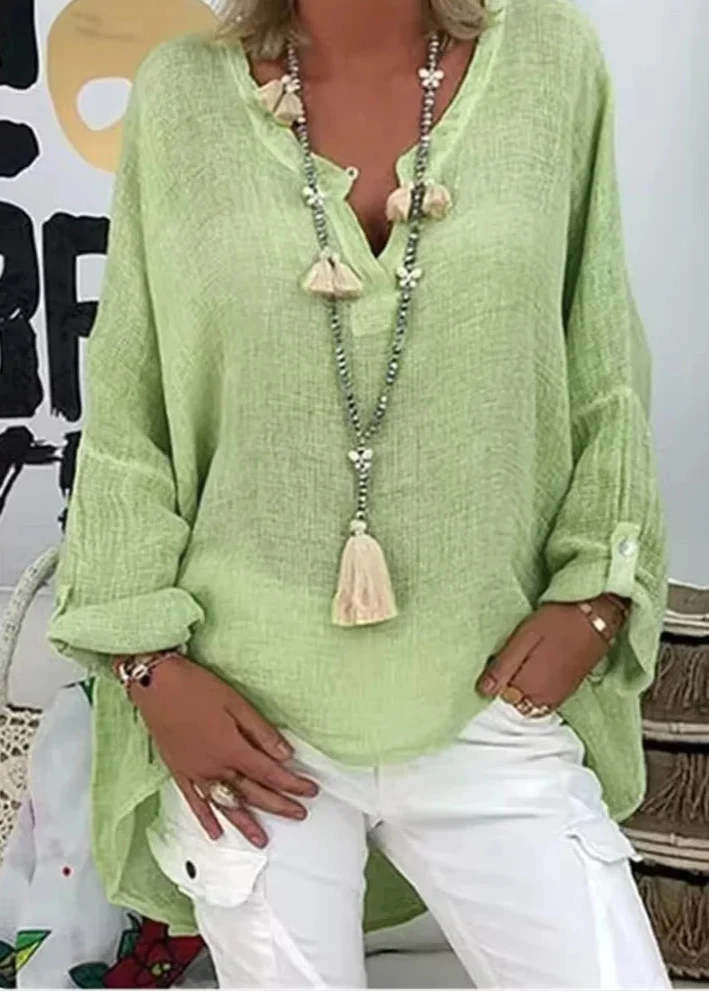 Chic women's oversized long sleeve button-up blouse, offering relaxed fit and comfort.